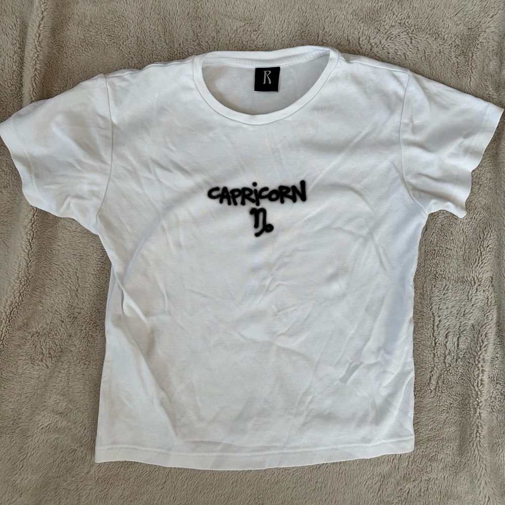 Realisation Par Zodiac Capricorn Baby Tee Shirt